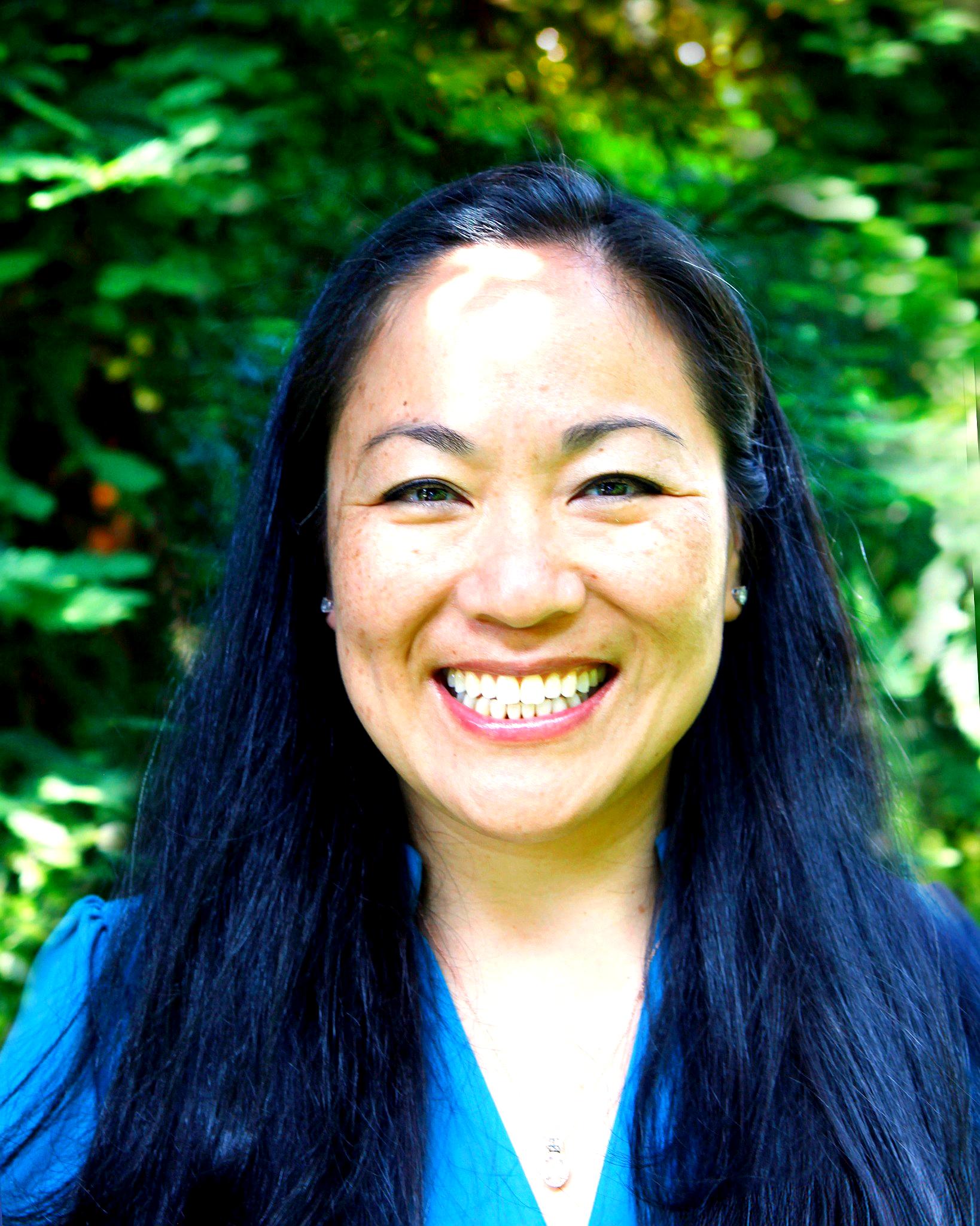 Tiffany Ash against leafy background